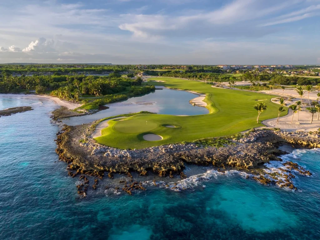 Coastal golf course beside turquoise ocean water in the Dominican Republic